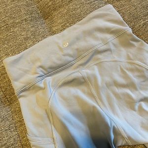 Lululemon, size 4 leggings with pockets.